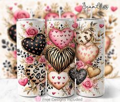 three candles are decorated with hearts and flowers