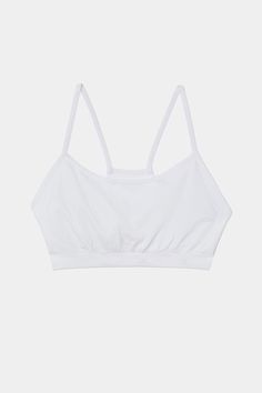 An easy to wear seamless bra designed to go from gym to everyday...seamlessly. Chafe-free fabric lets you move with easy and layers beautifully under any top. BEST FOR: running, yoga, crossfit, barre, pilates, spin class or gym workouts. Model is 5'10" and wears a size XS/S. Light Support Stretch Sports Bra, Versatile Light Support Sports Bra, Cotton Gym Activewear With Built-in Bra, Micro-elastic Seamless Tops With Built-in Bra, Crop Top With Built-in Bra For Light Exercise, Sporty Everyday Bra, Everyday Sporty Bra, Sporty Everyday Fitted Bra, Sporty Fitted Everyday Bra