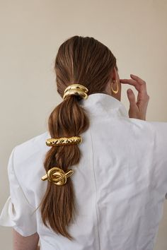 Everyday Basics | LELET NY Hair In A Ponytail, Geometric Arch, Hair Loop, A Ponytail, Elastic Hair Ties, Hair Rings, Metallic Hair, Gold Hair, Scrunchie Hairstyles