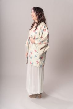 Magical pastel blue & pink floral shibori (tie dye) Japanese haori kimono jacket with beige lining. Wear over a slip dress, with jeans and a tee, or as a gorgeous robe. One size fits most! Length 33”Shoulder to shoulder 26.5”Sleeve 13”Sleeve hang 18.5” Excellent vintage condition, with normal wear and condition for its age.For international shipping rates, please send inquiries to our CONTACT page. Spring Daywear Kimono With Relaxed Fit, Spring Open Front Kimono With Relaxed Fit, Spring Open Front Relaxed Fit Kimono, Cream Kimono For Daywear In Spring, Spring Beige Open Front Kimono, Beige Open Front Kimono For Spring, Spring Open Front Beige Kimono, Spring Cream Kimono For Loungewear, Cream Kimono For Spring Loungewear