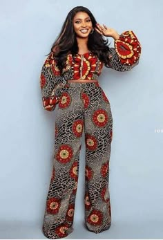 African print Ankara 2 piece set is made of 100% African wax cotton. Its a very breathable two piece set that can be worn for any event of Your choice It is made with love in Nigeria Rope in pants Side pockets in pants This piece is available in the exact fabric on the model. Kindly chat Us if You desire other fabric options and further questions concerning this outfit. Measurements Required -bust -waist -hips -thigh -height Care Instructions: Wash with soap Do not bleach Ankara Crop Top, African Jumpsuit, Ankara Trousers, African Print Pants, African Print Jumpsuit, Ankara Jumpsuit, Ankara Clothing, African Print Dress Ankara, Ankara Designs