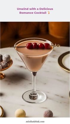 a chocolate martini with cherries on the rim