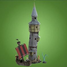 an image of a lego castle with a pirate ship in the front and green background