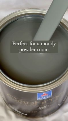 a paint can with the words perfect for a moody powderer room on it