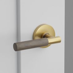 Elevate your space with the Walnut Door Lever on the Disk Rosette. Its contemporary design, crafted with solid brass and rich walnut, adds organic warmth and texture to any room. Upgrade your home with this stylish and functional addition. The Walnut Lever is for interior use only. Walnut is a living material that will age gracefully and evolve over time. No finish warranty is offered on the walnut. The Unlacquered Brass is a living finish and will change in color with time and use. More options Hardware Tape, Shower Door Handles, Stylish Doors, Walnut Doors, Shop Cabinets, White Door, Lighting Gifts, Age Gracefully, Room Upgrade