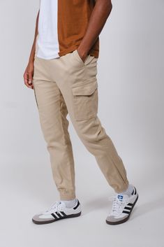 The Cargo Pocket Twill Jogger will be your new favorite pants to add to your wardrobe rotation. These joggers offer both comfy and durable styles. The fit is relaxed. Details include Pocket Twill Cargo Joggers, side pockets and elasticated drawstring waist Style: BFMI063F Athleisure Bottoms With Cargo Pockets For Everyday, Everyday Athleisure Bottoms With Cargo Pockets, Sporty Parachute Pants With Cargo Pockets And Tapered Leg, Sporty Everyday Cargo Pants With Elastic Waistband, Everyday Sporty Cargo Pants With Elastic Waistband, Sporty Everyday Cargo Bottoms, Sporty Bottoms With Cargo Pockets For Everyday, Everyday Sporty Cargo Bottoms, Sporty Everyday Cargo Style Bottoms