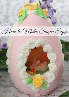 how to make sugar eggs with flowers on the top and bottom, in an egg shaped like a baby's head