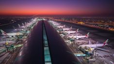 an aerial view of the airport at night