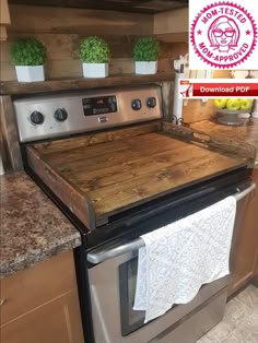 a kitchen with an oven and counter tops made out of wooden planks on top of the stove