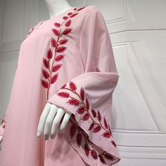 Elegant Embroidered Pink Kaftan, Elegant Pink Embroidered Kaftan, Traditional Long Sleeve Pink Abaya, Traditional Pink Long Sleeve Abaya, Embroidered V-neck Abaya For Wedding, Red Embroidered Long Sleeve Abaya, Embroidered V-neck Wedding Abaya, Pink Embroidered Wedding Abaya, Spring Wedding Embroidered Abaya