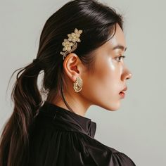 These earrings are perfect for adding a touch of bohemian flair to your look. Elegant Clip-on Ear Cuff, Gold Ear Cuff For Evening Wear, Bohemian Gold Clip-on Earrings, Chic Flower Earring For Wedding, Bohemian Clip-on Earrings For Party, Bohemian Dangle Earrings For Evening, Gold Bohemian Ear Cuff For Party, Bohemian Earrings For Evening, Bohemian Single Earring For Party