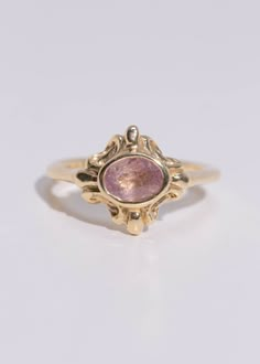 This ring is part of the Dear Survivor solitaire collection, a selection of fine gemstones encapsulated in a stunning solitaire setting. Unique Ring Setting, Colorful Wedding Ring, Colorful Engagement Rings, Intricate Ring, Alternative Wedding Ring, Graduation Ring, Pink Stone Ring, Graduation Rings, Rough Jewelry