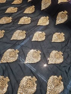 "Black color chiffon fabric with gold embroidery and silver embroidery usable for apparel,accessor and interior designs. Beautifully made to use for costumes, dance wear, decorations, weddings and much more. Width : 54\" inches Color : Blue with multicolored embroidery . Thank you for your coming! Please read policy before placing an order. Please contact us via ETSY Conversations for more details. Fabrics are sold by the yard. We will continue length of multiple yards . It will come in one piec Embellished Chanderi Fabric In Traditional Drape, Embellished Chanderi Embroidered Fabric For Wedding, Silver Embroidered Sets With Traditional Drape, Gold Embroidered Saree Fabric With Mirror Work, Gold Embroidered Saree With Mirror Work, Gold Kundan Blouse Piece For Wedding, Elegant Gold Silk Thread Sets, Party Silver Blouse Piece With Dupatta, Silver Blouse Piece With Dupatta For Party