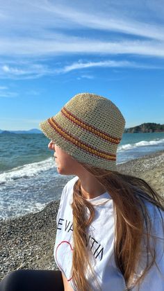 Stylish Striped Raffia Bucket Hat- Perfect for Summer Sun Protection, Beach Straw Bucket Hat , Hat For Beach Holiday, Travel The hat is crocheted from natural raffia Lightweight material allows air to pass through Protects from the sun Comfortably Can be folded, easily return to shape Easy to clean with s damp cloth For the choice size, please refer to messages. Handmade Beige Straw Hat For Beach Season, Bohemian Handmade Paper Straw Sun Hat, Handmade Toquilla Straw Sun Hat For Beach Season, Yellow Crochet Beach Hat, Handmade Paper Straw Sun Hat For Beach, Summer Straw Hat For Beach, Summer Beach Straw Hat Cap Style, Bohemian Straw Bucket Hat For Outdoor, Summer Straw Cap For Beach