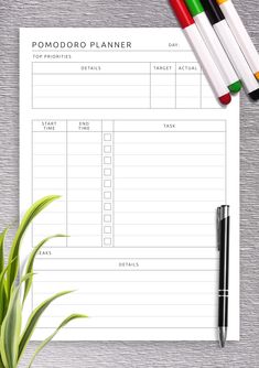 the printable pomodoro planner is next to some pens and a plant