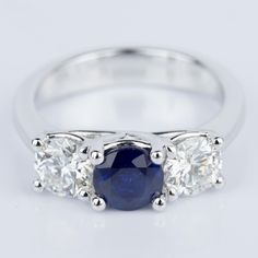 Would you say YES to this beautiful Trellis Three Stone Sapphire & Diamond Engagement Ring in White Gold? Wedding Ring Upgrade Ideas, Blue Sapphire Engagement Ring Oval, Wedding Ring Upgrade, Sapphire Engagement Ring Oval, Rings For Mom, Sapphire Diamond Engagement Ring, Emerald Wedding Band, Diamond Sapphire Engagement Ring, Sapphire Diamond Engagement