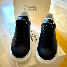 Brand New Men’s Alexander Mcqueen Sneakers. Includes Original Box. Never Been Worn. White Alexander Mcqueen Sneakers Outfit Men, Designer Custom Sneakers With Contrast Sole In Calf Leather, Designer Wingtip Sneakers With Leather Sole, Designer Formal Custom Sneakers With Round Toe, White Alexander Mcqueen Sneakers Outfit, Custom Calf Leather Sneakers With Studded Outsoles, Luxury Leather Sneakers With Studded Outsoles, Luxury Custom Leather Sneakers With Studded Outsoles, Luxury Wingtip Calf Leather Sneakers