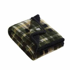 two green and black plaid blankets folded on top of each other