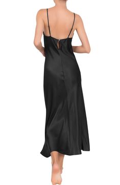 Fall in love with this smooth, satiny nightgown designed in a slinky silhouette with slender adjustable straps. 100% rayon Hand wash, dry flat Made in the USA of imported fabric Black Owned and Founded Satin Finish V-neck Nightgown For Loungewear, Sleeveless Modal Satin Sleepwear, Modal Satin Sleepwear With Spaghetti Straps, Silk Nightgown For Night, Silk Nightgown With Spaghetti Straps For Loungewear, Satin Nightgown With Bias Cut For Sleep, Elegant Camisole Nightgown With Built-in Bra, Silk Sleepwear For Evening, Satin Bias Cut Nightgown For Sleep