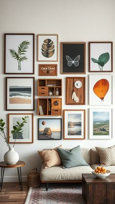 a living room filled with lots of pictures on the wall