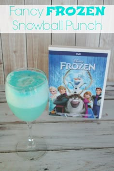 the frozen snowball punch is next to a book