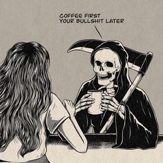 two women sitting at a table, one with a skull on her head and the other holding a coffee cup