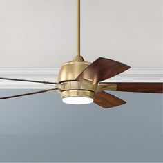 a ceiling fan with two wooden blades and a light fixture on the top of it