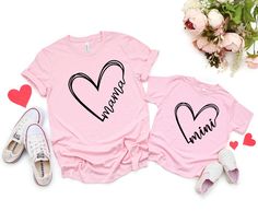 "Mama mini custom Heart T-Shirt, Mama mini personalized heart Tshirt, Mothers Day Gift Tee, gift shirt for mom, New Mom Gift \"CUSTOMIZATION\" If you are looking for a specific shirt style, design or color not offered in my store, please let me know. \"RETURNS / EXCHANGES\" Unfortunately, due to the customization of the shirts we are unable to accept returns or exchanges on merchandise. In case of dispute, the buyer pays the return shipping fee. Please contact me with any problems and I will wor Personalized Pink T-shirt For Mother's Day, Mother's Day Short Sleeve T-shirt With Heart Print, Mother's Day Heart-shaped T-shirt With Letter Print, Personalized Family Matching Pink T-shirt, Short Sleeve T-shirt With Heart Print For Mother's Day, Matching Letter Print T-shirt Gift, Mother's Day Heart Print Short Sleeve T-shirt, Matching Letter Print T-shirt As Gift, Family Matching Pink T-shirt As Gift