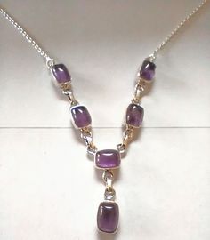 Exclusive Amethyst necklace handmade by artisans from India. Exquisite Amethyst set in sterling silver connected with a sterling silver rolo chains.length 20 inches adjustable to 18 inches.weight 9.8 grams Silver Amethyst Necklace With Adjustable Chain, Purple Sterling Silver Necklace With Adjustable Chain, Silver Amethyst Necklace With Cabochon, Silver Amethyst Cabochon Necklace, Purple Sterling Silver Jewelry With Adjustable Chain, Amethyst Set, Amethyst Necklace, Necklace Sterling Silver, Necklace Handmade