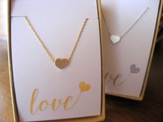 I love this dainty heart necklace.  It is the perfect inexpensive VALENTINES GIFT for the Wife, Girlfriend, or Daughter. Delicate Heart Cut Necklace For Wedding, White Heart Necklace For Wedding On Valentine's Day, Valentine's Day Wedding Necklace With Delicate Chain, Gold Heart Pendant Necklace As Wedding Gift, Wedding Necklace With Delicate Chain For Valentine's Day, Minimalist Heart Cut Necklace For Wedding, Minimalist Heart Cut Wedding Necklace, Double Heart Charm Necklaces For Wedding And Mother's Day, Elegant Heart Necklace For Valentine's Day Bridesmaid Gift