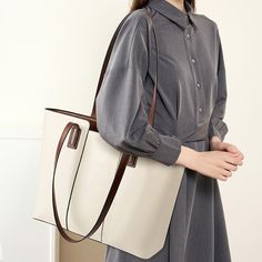 Gender: Women Type: Tote Bag Features: Adjustable Strap, Inner Pockets Main Materials: Cowhide Lining: Polyester Type of Closure: Zipper Style: Casual, Daily, Stylish Size: Length: 40 cm / 15.75 " Width: 28 cm / 11.02 " Height: 12 cm / 4.72 " Large Size Beige Bags, Large Size Beige Shoulder Bag, Trendy Large Leather Shoulder Bag, Large Beige Satchel Shoulder Bag, Large Elegant Tote Satchel, Beige Faux Leather Shoulder Bag For Office, Large Beige Shoulder Bag For Shopping, Large Elegant Satchel For Travel, Elegant Large Bags With Double Handle