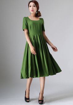 "This Prairie Linen dress is designed with soft linen in forest green hues, perfect with Puff sleeve, round neckline, and back button closure, This womens swing dresses can be styled with light weight a accessories for a daring ensemble . vintage inspired design, Handmade by Xiaolizi. DETAILS 50% linen, 50% Cotton, Medium weight Linen No lining Square neckline Short Puff Sleeve Seam pockets Back Zipper Below Knee length Spring, Summer House dress More color and More size https://etsy.me/2TGUAgq Green Pleated A-line Maxi Dress, Dark Green Knee-length Summer Dress, Dark Green Fitted Casual Dress, Casual Fitted Dark Green Dress, Fitted Dark Green Casual Dress, Dark Green Short Sleeve Dresses For Spring, Flowy Green Midi Dress Solid Color, Dark Green Knee-length Midi Dress For Summer, Green Midi-length Dress With Solid Color