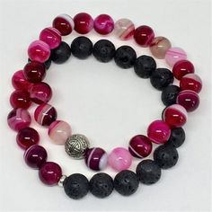 Pink Agate Dyed & Lava Diffuser Bracelet 2 Piece Set Pink Agate Jewelry With Colorful Beads, Pink Agate Hand-strung Bracelets, Pink Agate Jewelry With 8mm Beads, Pink Agate Beaded Bracelets With Natural Stones, Pink Agate Bracelets With 8mm Beads, Red Agate Beaded Bracelets For Meditation, Red Agate Beaded Bracelet For Meditation, Pink Agate Round Bead Crystal Bracelet, Pink Agate Spiritual Bracelets