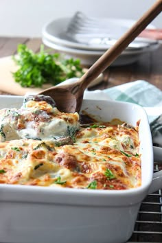 a casserole dish with meat and cheese in it