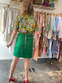 Dosa Green Silk Wrap Skirt. A fun and bright knee-length skirt in a grass green textured silk. Gives a modern-luau vibe! Interior is lined in a gorgeous patchwork stitched pattern, so the skirt could potentially be worn reversible as well! Wrap ties at the waist, allowing for an adjustable fit. Marked one size, but best fits a size M/L. 100% silk, dry clean only. Made in the USA. In excellent, like-new condition. Approx. Measurements: Adjustable waist: 15" through 18" laid flat across Length: 21 Green Silk Bottoms For Summer, Green Lined Skirt For Spring, Green Silk Bottoms For Spring, Summer Flowy Green Mini Skirt, Summer Green Flowy Mini Skirt, Green Flowy Mini Skirt, Flowy Green Mini Skirt For Summer, Green Flared Mini Skirt For Summer, Green Knee-length Mini Skirt For Spring