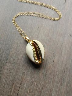 Cowrie Shell Necklace, Gold Shell Necklace, Gold Cowrie Shell, Boho Necklace, Layering Necklace, Gol Boho Necklace Layering, Gold Shell Necklace, Cowrie Shell Necklace, Cowry Shell, Summer Capsule Wardrobe, Necklace Layering, Summer Capsule, Shell Bracelet, Myrtle Beach Sc