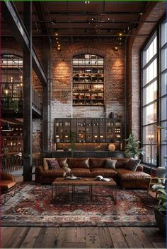 a living room filled with furniture and lots of windows