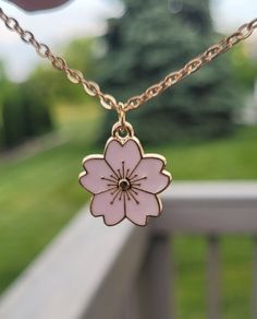 This necklace has a cute Sakura (cherry blossom) charm.  The charm measures 7/8" wide.  *Choose your flower color and necklace length that check out. The chain is stainless steel.  This will be sent to you in a gift bag or box. This is perfect for anyone! Birthdays, anniversaries, jewelry for bridesmaids, gifts for Mom, or any other occasion. Please contact me if you have any custom requests or questions. Shipping is typically 4 to 6 days in the US, Or you can upgrade to Priority (2 to 3 days) o Sakura Necklace, Cute Sakura, Cherry Blossom Necklace, Jewelry For Bridesmaids, Sakura Cherry Blossom, Gift Flower, Peach Blossoms, Sakura Haruno, Pretty Jewellery