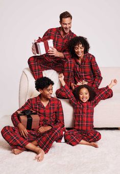 Get the whole family ready for cosy nights in with this unisex pyjama set. In a classic red check featuring a long sleeve button down top and full length bottoms with an elasticated waistband for ultimate comfort. This will be their new favourite PJ's this season! Cute Matching Pajamas, Plaid Christmas Party, Gift Wrapping Hacks, Wrapping Hacks, The Day After Christmas, Day After Christmas, Family Matching Pajamas, Mens Plaid Flannel, Thermal Pajamas