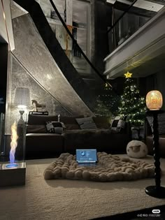 a laptop computer sitting on top of a rug in front of a living room filled with furniture