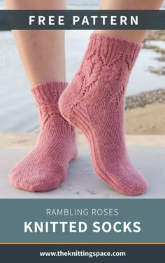 a woman's legs in pink socks with text overlay that reads, free pattern rambling roses knitted socks