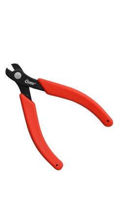 a pair of red scissors with black handles on an isolated white background for use in construction projects