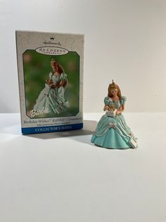 the figurine is next to the boxed box for it's appearance as a princess