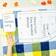 a person holding up a piece of paper with the words pocket cuts cut on it