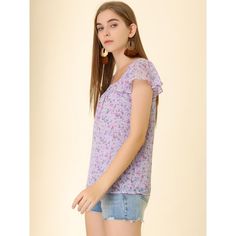 This floral top is sure to inject a floral flourish into your wardrobe. Made of a lightweight chiffon fabric for a soft fit, this top boasts a floral print throughout and a flattering and vintage-inspired square neckline. Wear it with jeans or a skirt for a chic style that will take you from day to evening. With summer floral and greenery details, this breezy flowy blouse features fluttery sleeves. Optimal for day or night, this floral-printed blouse features vintage details like a square neck a Floral Print Chiffon Blouse, Heart Print Blouse, Three Quarter Sleeve Blouses, Blouse Purple, Ruffle Fabric, Vintage Details, Layered Blouse, Floral Print Chiffon, Flowy Blouse