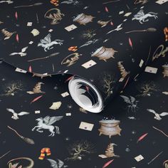 a black wallpaper with an image of animals and other things on it's surface