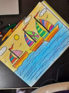 an art project with colored pencils and crayons