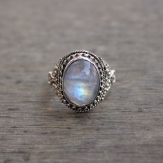 Gemstone - Natural Rainbow Moonstone Gemstone Size - 12x16 mm oval Metal - Sterling Silver natural AAA rainbow moonstone set with a sterling silver handmade ring Each Ring made with Precision and love, these rings are perfect for everyday use and a perfect accessory to wear at work. Rings can be customized on request and gemstone can be switched to any other as per requirement. Other beautiful designs uploaded with fabulous gemstones. kindly visit my store to view the complete collection. Feel f Moonstone Crystal Ring, Oval Cabochon, Gift, Moonstone Crystal Ring Oval Cabochon For Gift, Moonstone Oval Cabochon Crystal Ring Gift, Silver Oval Cabochon Moonstone Ring For Wedding, Bohemian White Oval Crystal Ring, Handmade Moonstone Ring Gift, Silver Oval Moonstone Ring For Anniversary, Handmade Moonstone Ring For Gift, Oval Moonstone Ring Gift