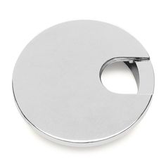 a round metal object on a white background