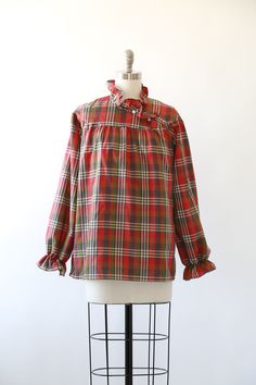 "Vintage 1970s Fall plaid blouse High neck ruffle neck + puff ruffle sleeves Great vintage condition M e a s u r e m e n t s: Size: fits like a M L BUST: 23\" Waist: 24\" Total length: 27 1/2\" Sleeves: 23\" Label: Lucky winner +All Measurements are taking while garment is lying flat+ + Jewelry, belts, and any other accessories are NOT included unless specifically stated in description+ i n s t a g r a m: cali_vintage_usa" Plaid Blouse For Daywear In Fall, Vintage Tops For Fall Daywear, Retro Plaid Blouse For Fall, Retro Blouse For Fall, Retro Blouse For Daywear In Fall, Vintage Blouse With Ruffled Collar For Fall, Retro Ruffled Blouse For Fall, Vintage Plaid Blouse For Fall, Fall Daywear Plaid Blouse